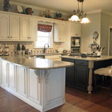 View this Mount Juliet customer’s kitchen cabinets after their European transformation with this warm modern Tuscan glaze